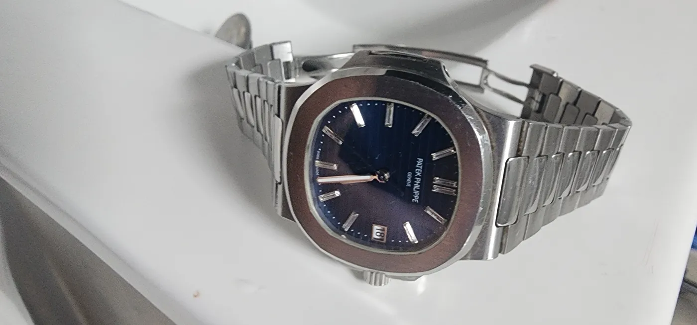 Reloj Patek Philippe Geneve estilo Nautilus carátula azul